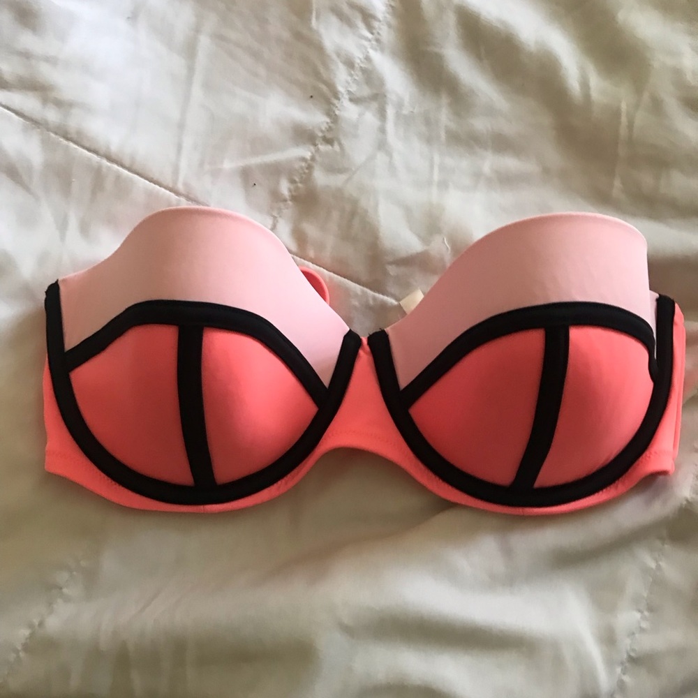 Neon coral bikini top.